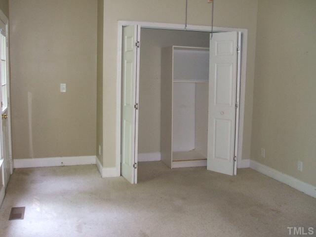 4217 Pope Road Durham, NC 27707 - Photo 7 of 10 an empty room with closet area
