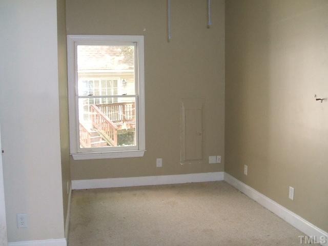 4217 Pope Road Durham, NC 27707 - Photo 8 of 10 an empty room with a window