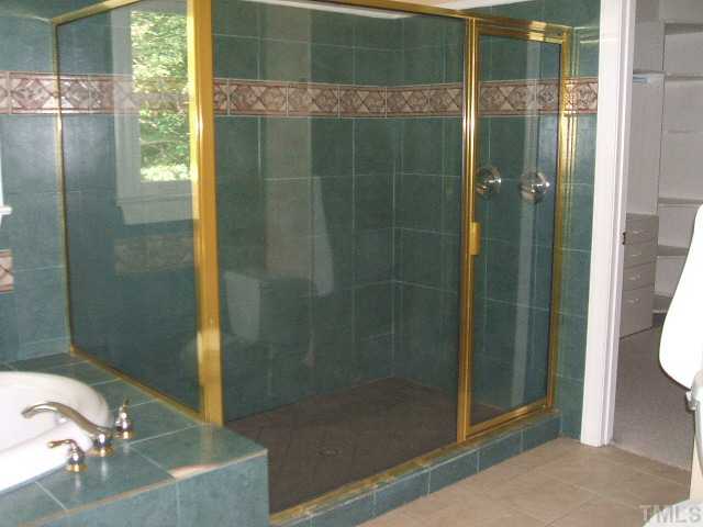 4217 Pope Road Durham, NC 27707 - Photo 9 of 10 a bathroom with a shower and a sink
