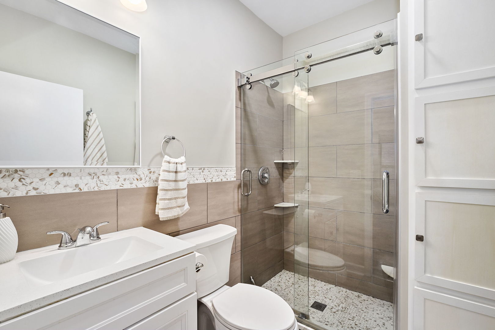 4429 North Beacon Street, Unit 2N Chicago, IL 60640 - Photo 21 of 32 a bathroom with a sink toilet and shower