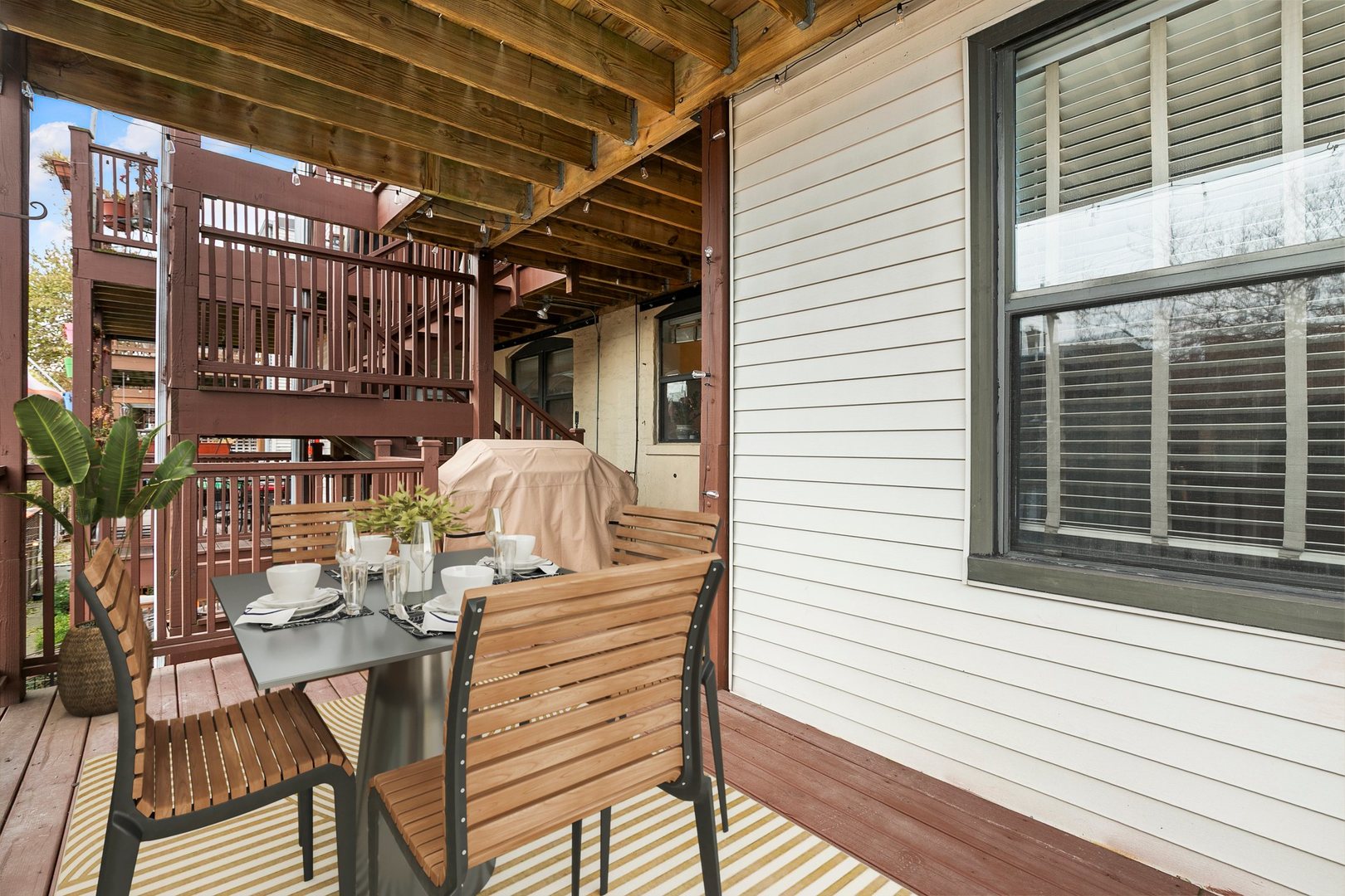4429 North Beacon Street, Unit 2N Chicago, IL 60640 - Photo 29 of 32 a view of balcony and deck with furniture