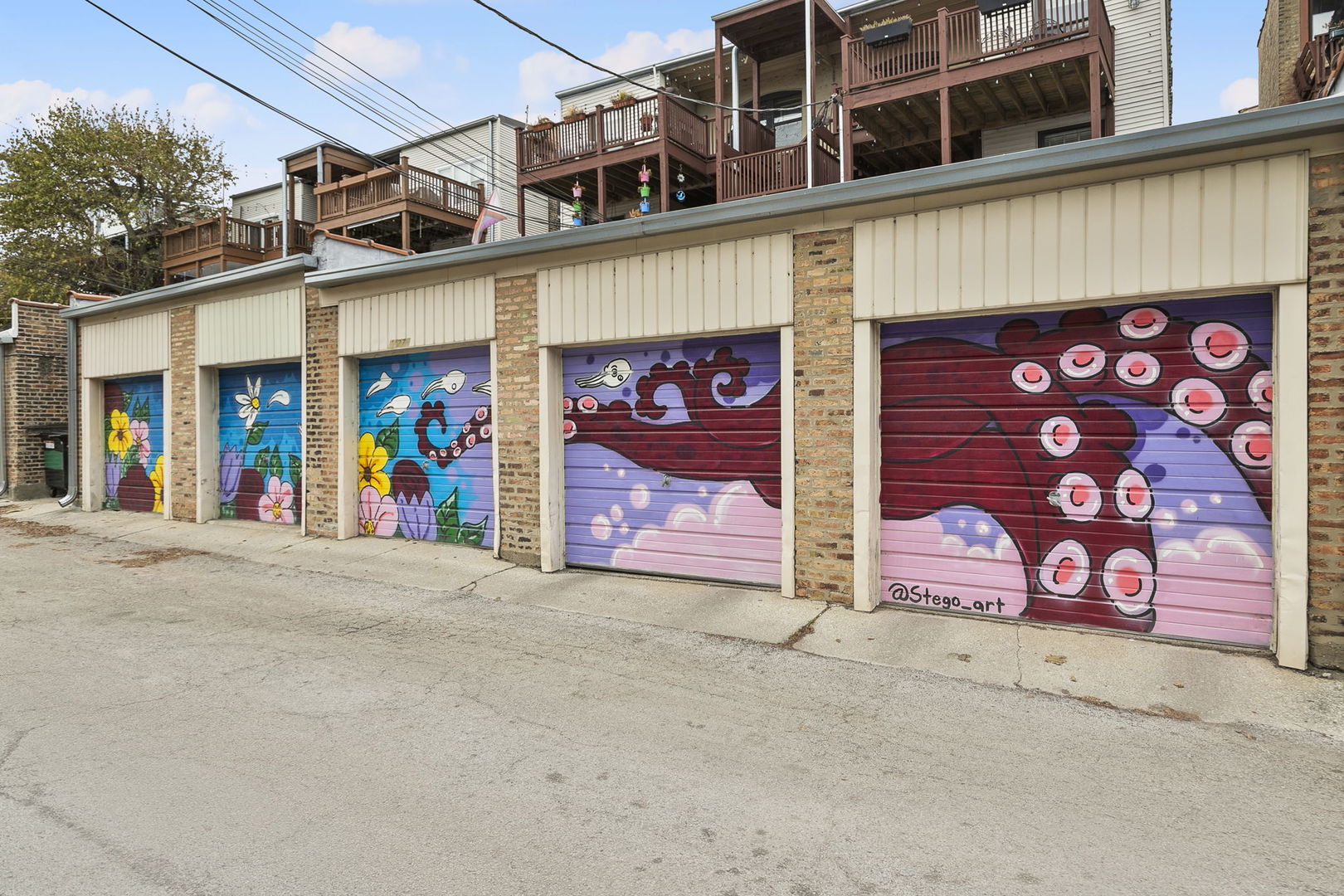 4429 North Beacon Street, Unit 2N Chicago, IL 60640 - Photo 31 of 32 a view of a street with shops
