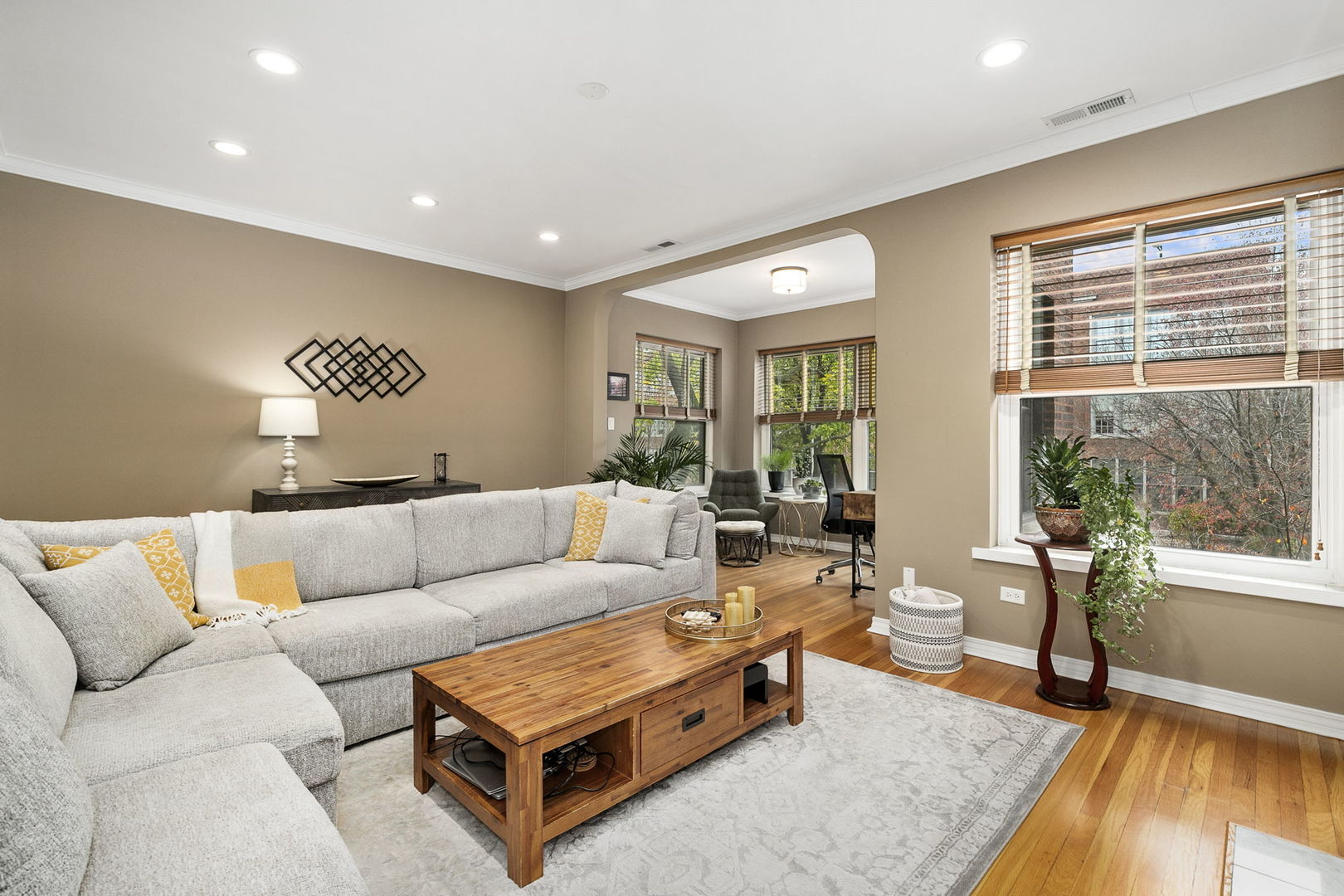 4429 North Beacon Street, Unit 2N Chicago, IL 60640 - Photo 4 of 32 a living room with furniture and a rug