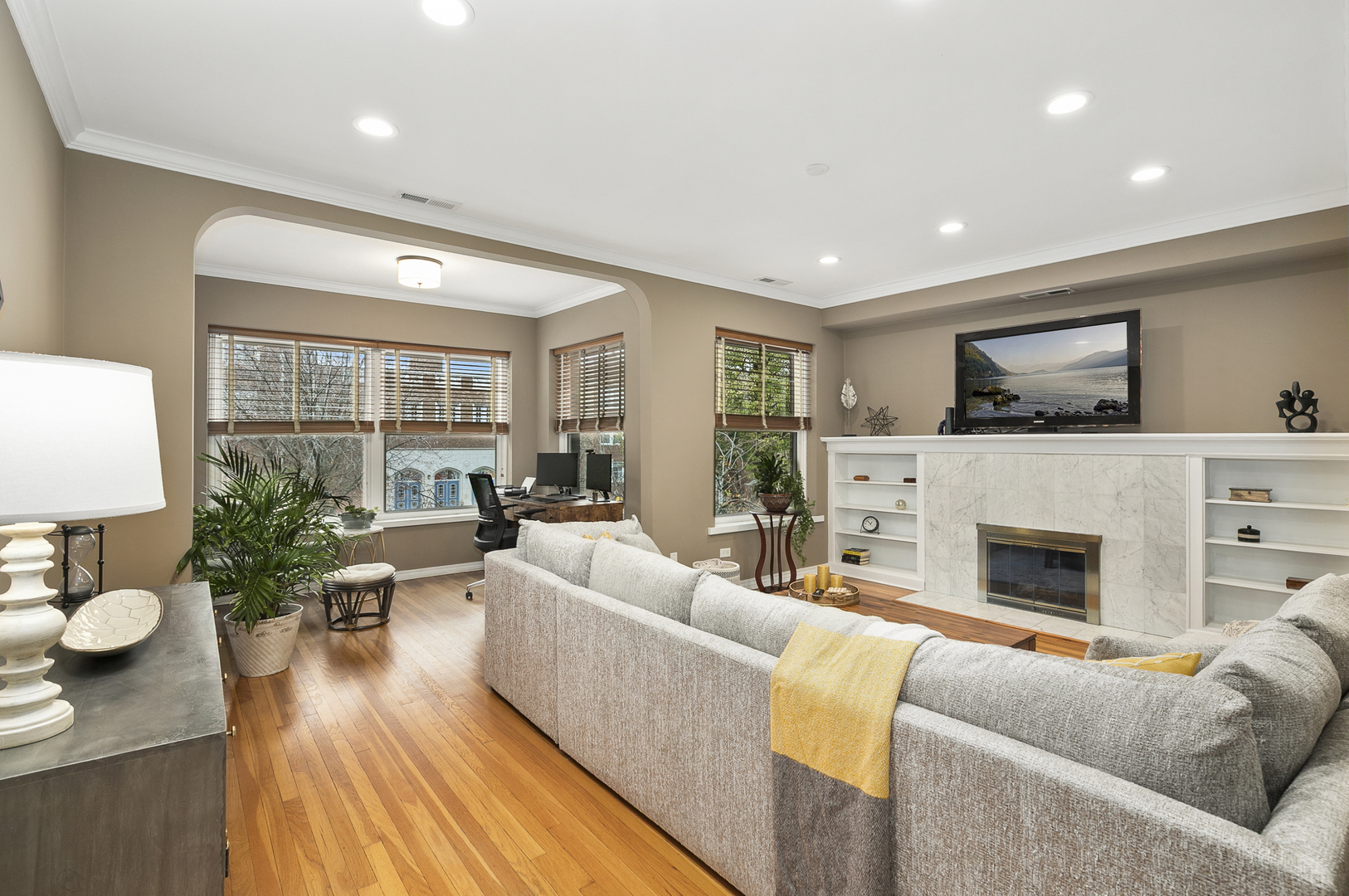 4429 North Beacon Street, Unit 2N Chicago, IL 60640 - Photo 5 of 32 a living room with furniture and a fireplace