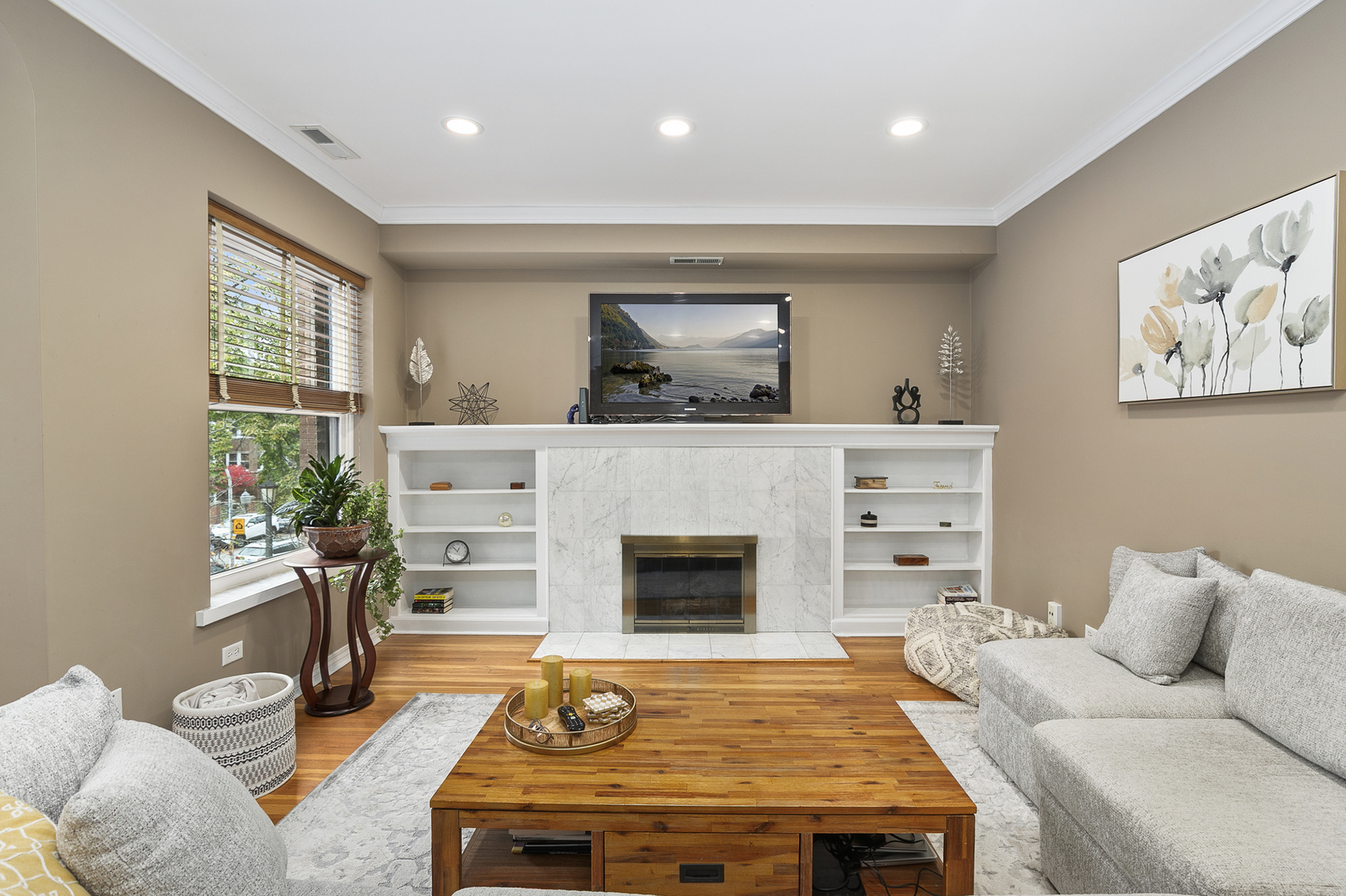 4429 North Beacon Street, Unit 2N Chicago, IL 60640 - Photo 7 of 32 a living room with furniture and a fireplace