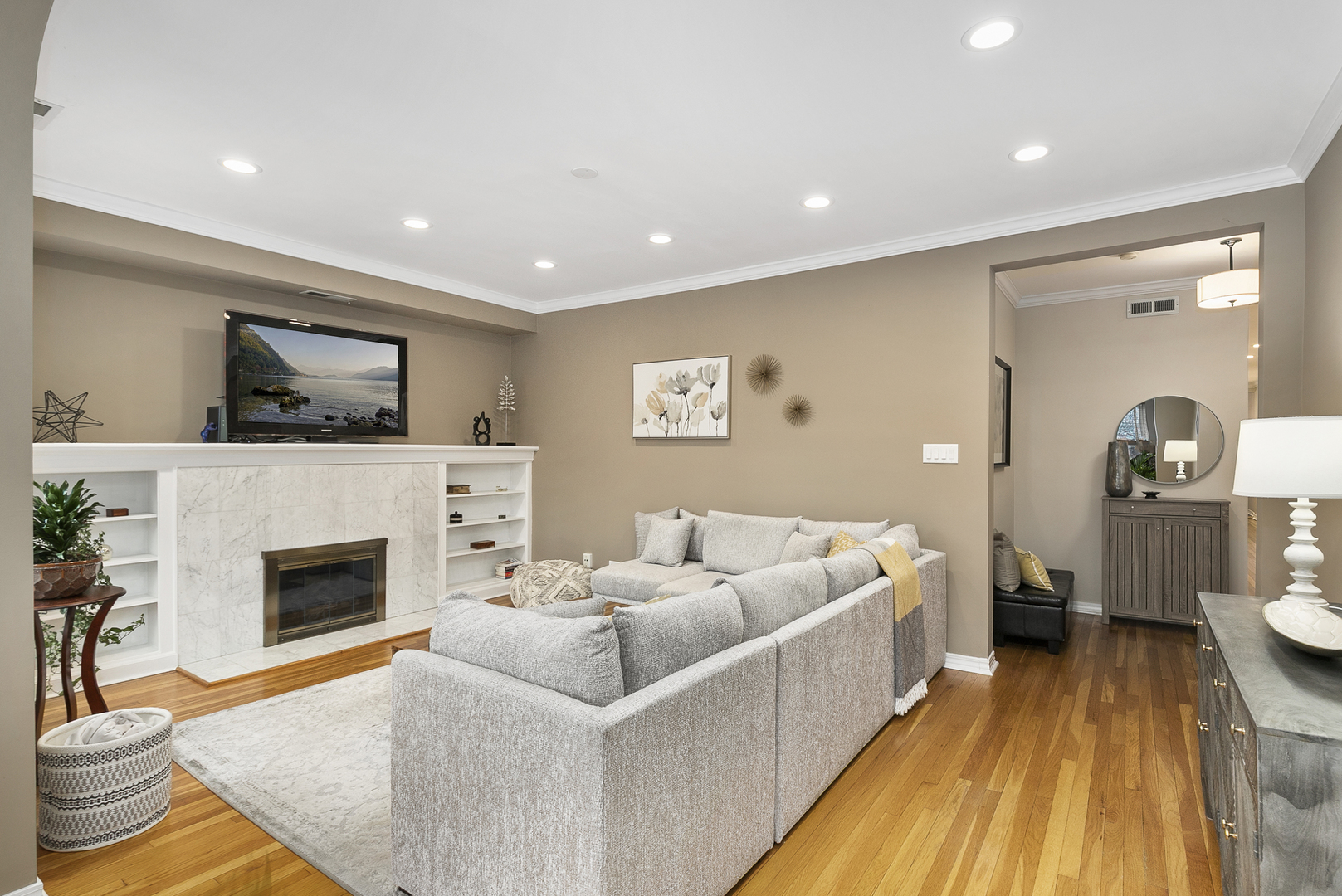 4429 North Beacon Street, Unit 2N Chicago, IL 60640 - Photo 8 of 32 a living room with furniture and a fireplace