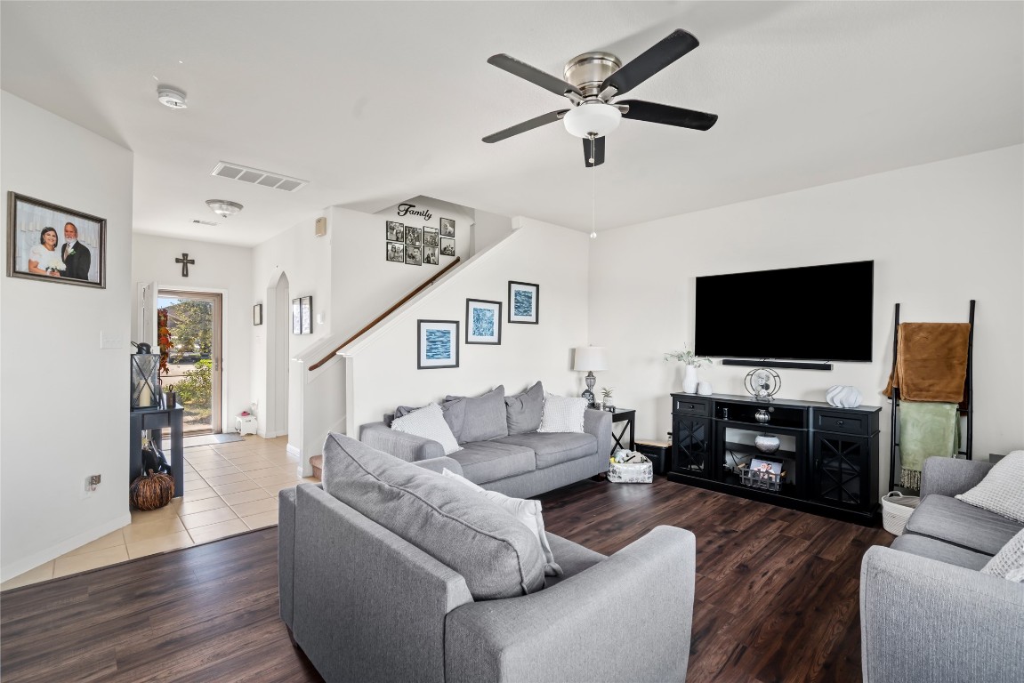2011 Beach Bluff Road Rosenberg, TX 77469 - Photo 12 of 34 a living room with furniture and a flat screen tv