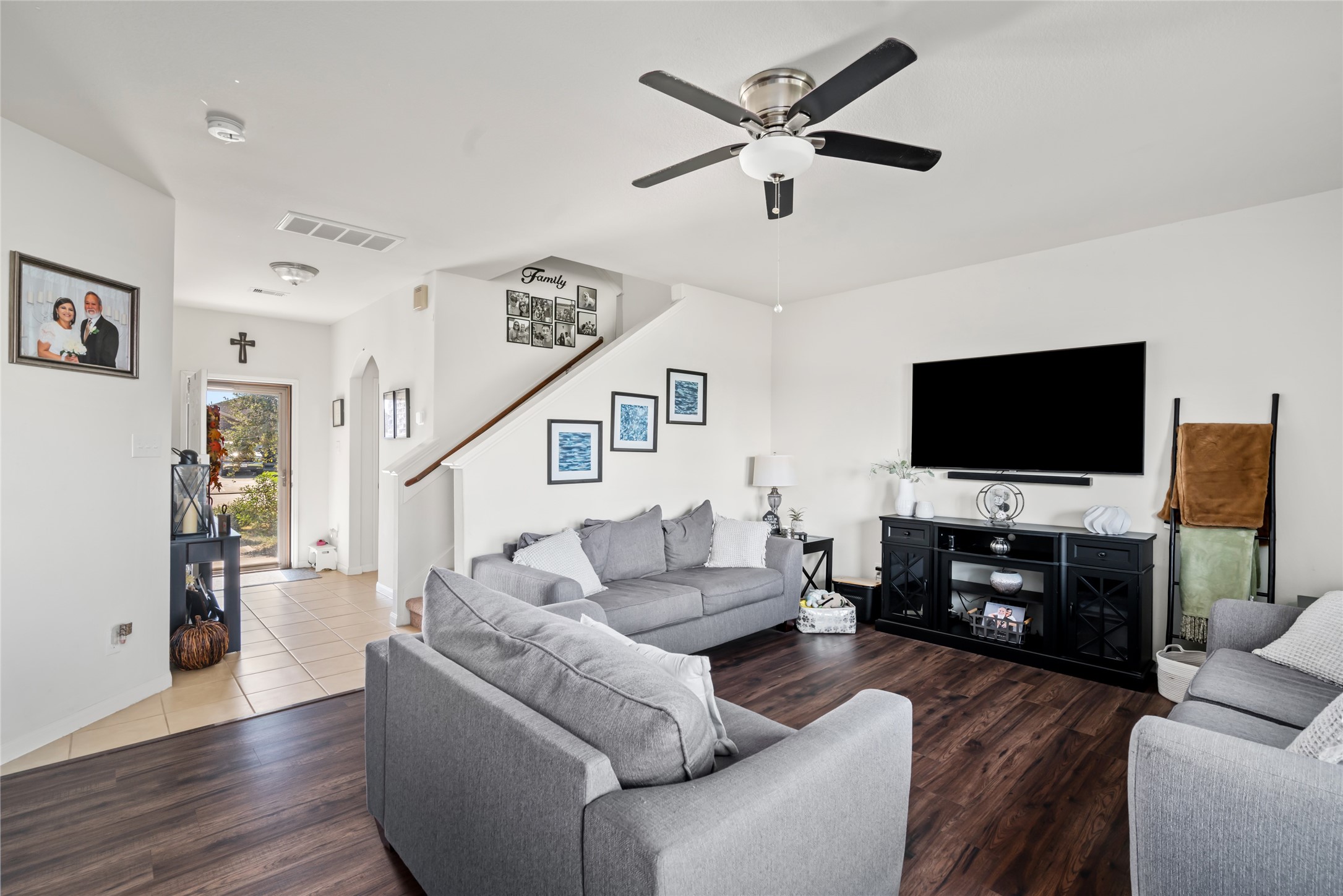 2011 Beach Bluff Road Rosenberg, TX 77469 - Photo 12 of 34 This cozy room, with its wide windows letting in plenty of natural light, offers the perfect setting for TV and movie nights. It’s a relaxed space where you can unwind, enjoy your favorite shows, and create a comfortable escape.