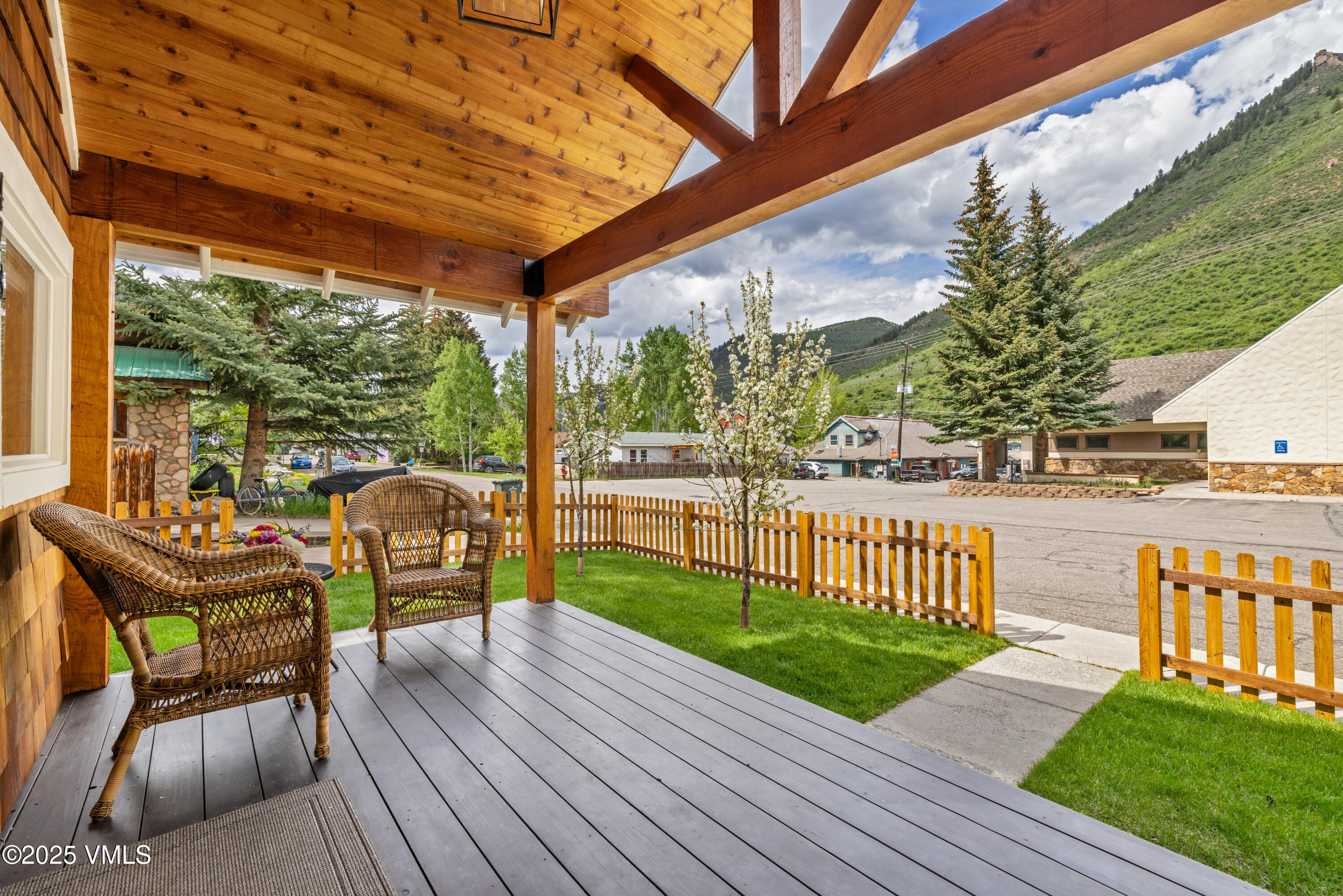 473 Pine Street Minturn, CO 81645 - Photo 22 of 26 a view of a deck with wooden floor and outdoor seating