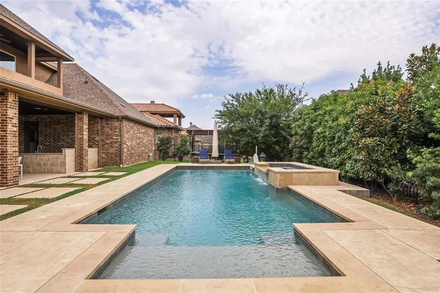 a view of a swimming pool with an outdoor space