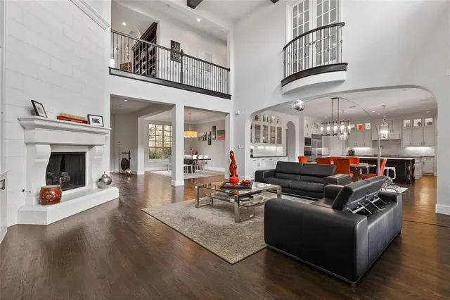 a living room with furniture or fireplace and a chandelier