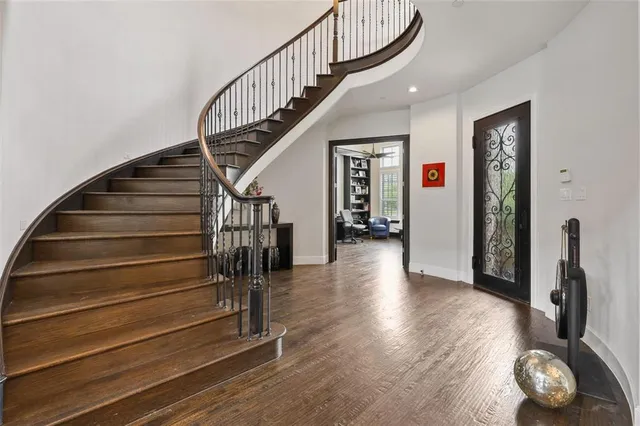 a view of entryway with wooden floor
