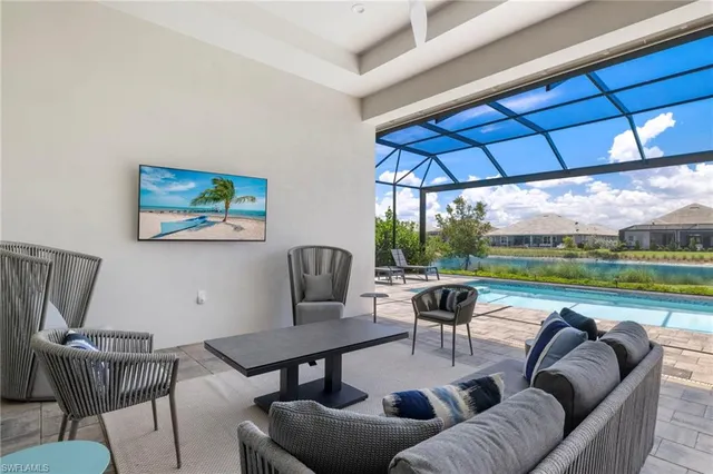a view of a livingroom with furniture and pool table