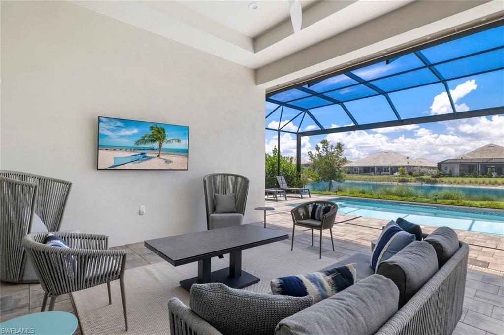 6136 Rodney Bay Lane Naples, FL 34113 - Photo 25 of 29 a view of a livingroom with furniture and pool table