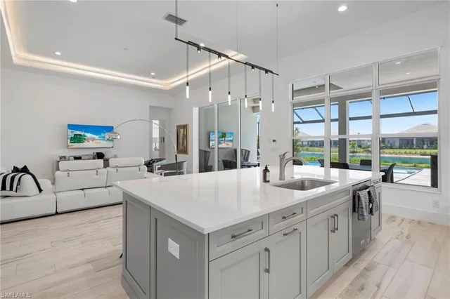 a very nice looking living room with a large window