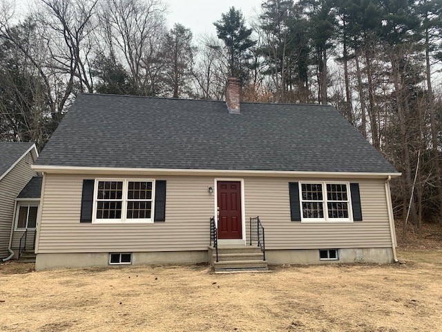 59 Strowbridge Road Northfield, MA 01360 - Photo 1 of 26 a front view of a house with a yard