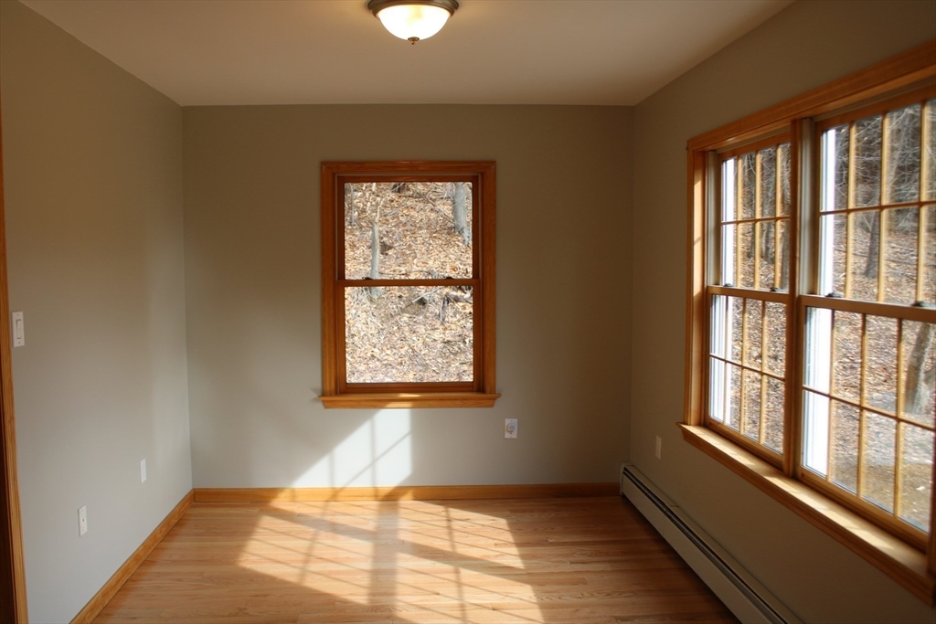 59 Strowbridge Road Northfield, MA 01360 - Photo 11 of 26 a view of an empty room and window