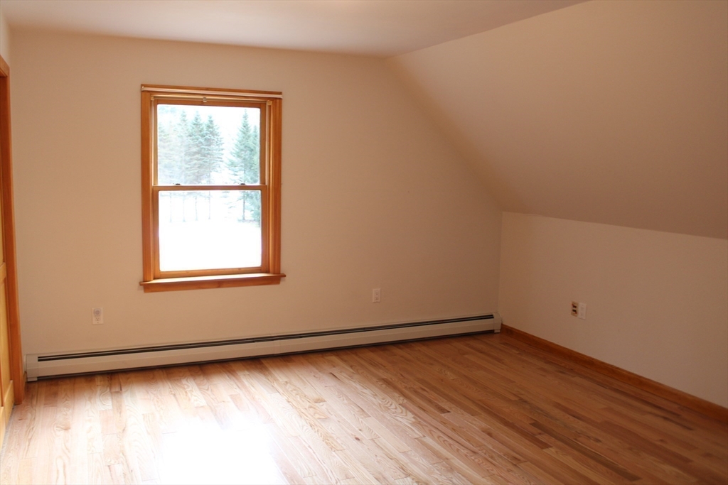 59 Strowbridge Road Northfield, MA 01360 - Photo 16 of 26 an empty room with a window