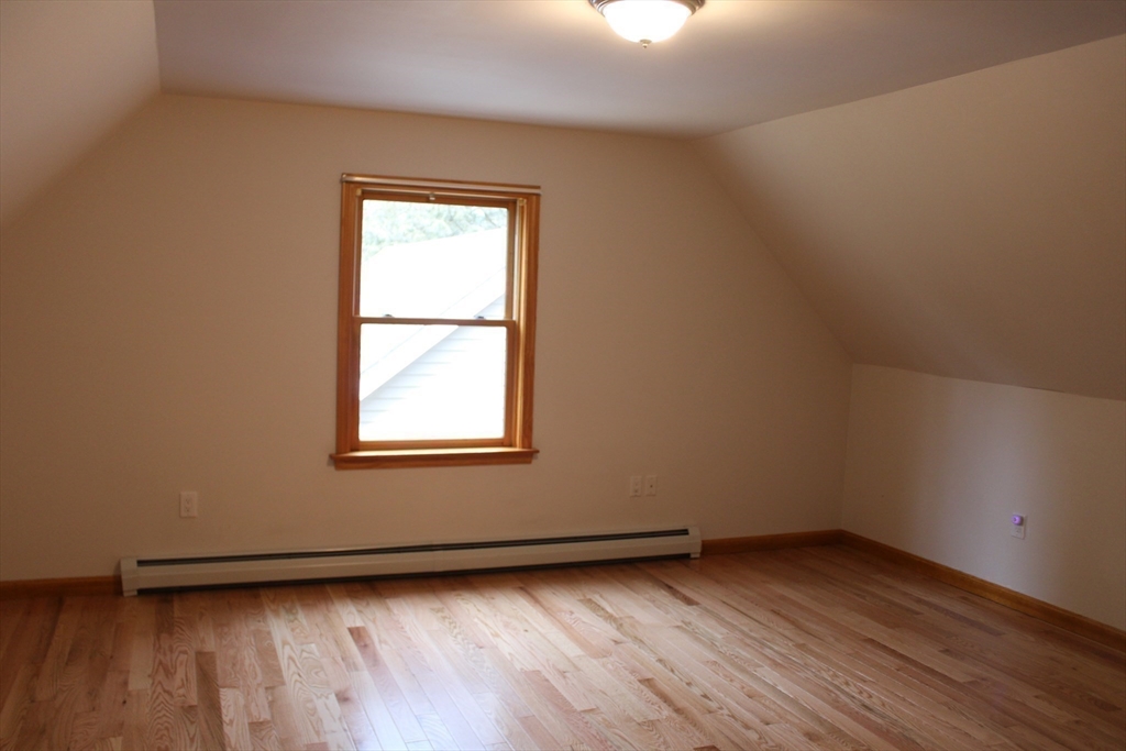 59 Strowbridge Road Northfield, MA 01360 - Photo 19 of 26 wooden floor and window in an empty room