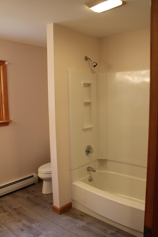 59 Strowbridge Road Northfield, MA 01360 - Photo 23 of 26 a bathroom with a bathtub and a toilet
