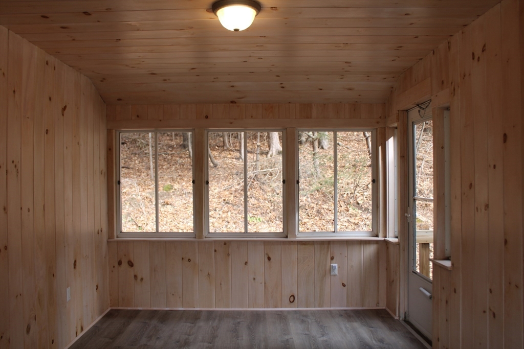 59 Strowbridge Road Northfield, MA 01360 - Photo 8 of 26 a view of an empty room with a window