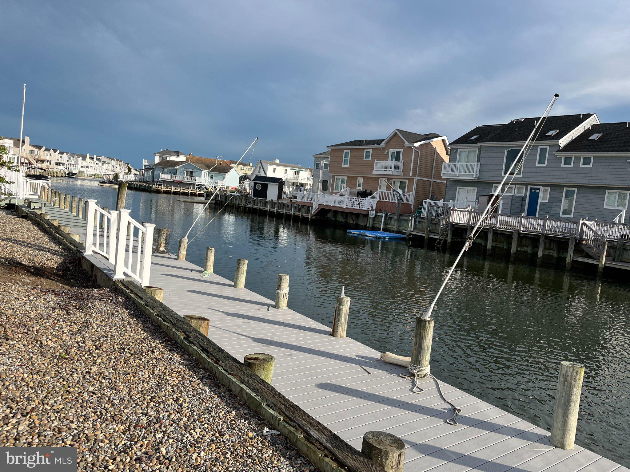 2128 Mill Creek Road Manahawkin, NJ 08050 - Photo 8 of 15 Charming waterfront dock at sunset.