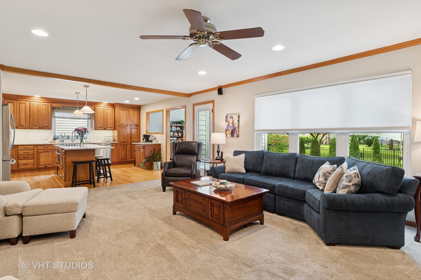 2124 Wicklow Road Naperville, IL 60564 - Photo 8 of 35 a living room with furniture kitchen view and a large window