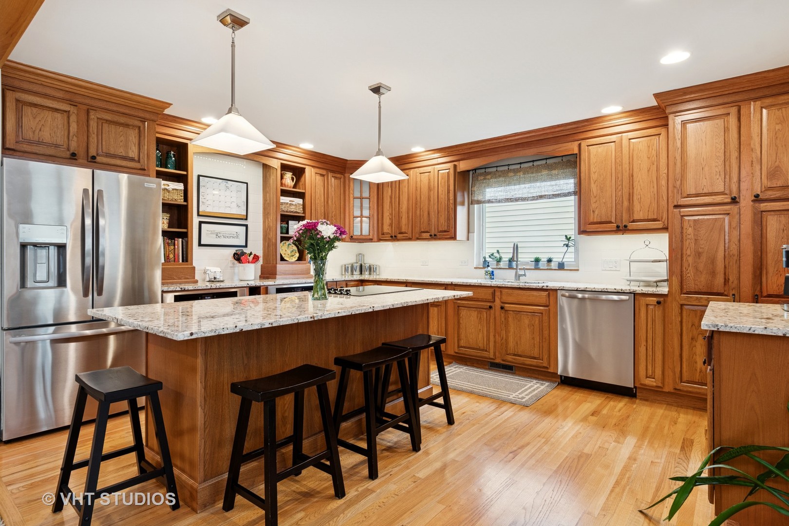 2124 Wicklow Road Naperville, IL 60564 - Photo 10 of 35 a kitchen with granite countertop a sink appliances and cabinets
