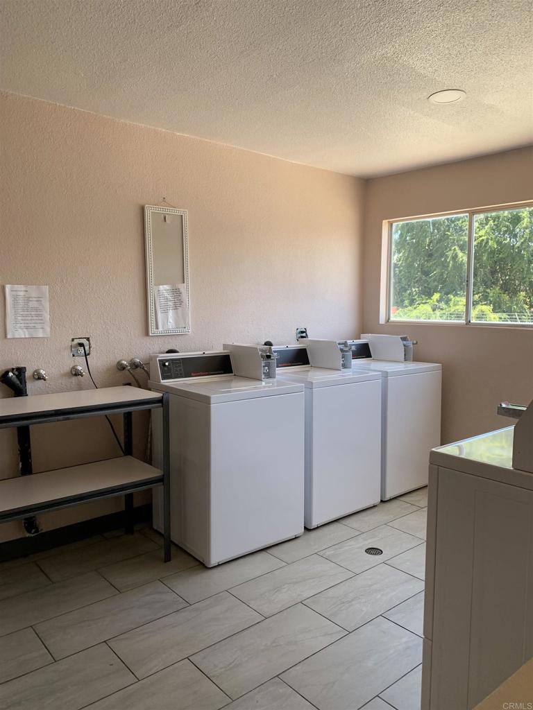 742 A Street, Unit 15 Ramona, CA 92065 - Photo 16 of 18 a utility room with dryer and washer