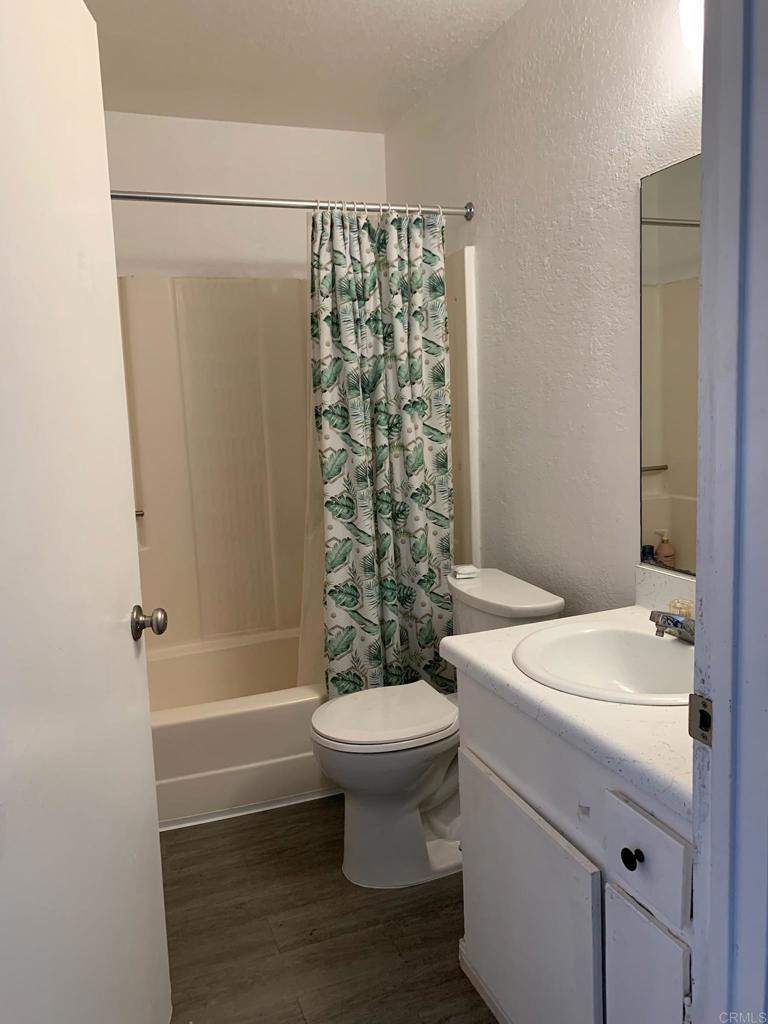 742 A Street, Unit 15 Ramona, CA 92065 - Photo 9 of 18 a bathroom with a sink toilet and shower