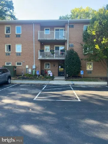 a view of a swimming pool and a yard