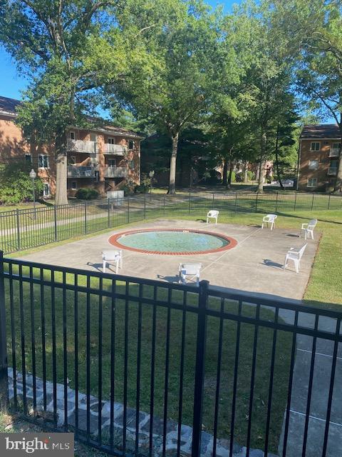 300 Winding Way, Unit B16 Downingtown, PA 19335 - Photo 21 of 21 a view of a swimming pool with a patio