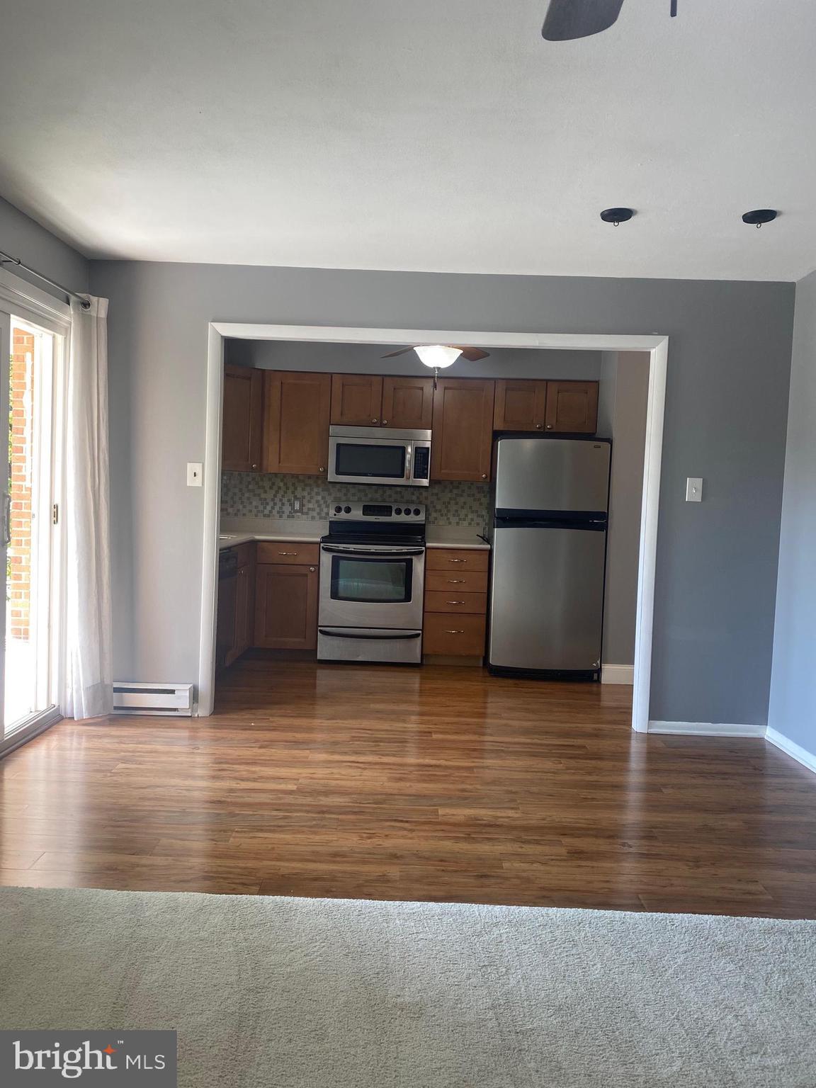 300 Winding Way, Unit B16 Downingtown, PA 19335 - Photo 6 of 21 a view of kitchen and wooden floor
