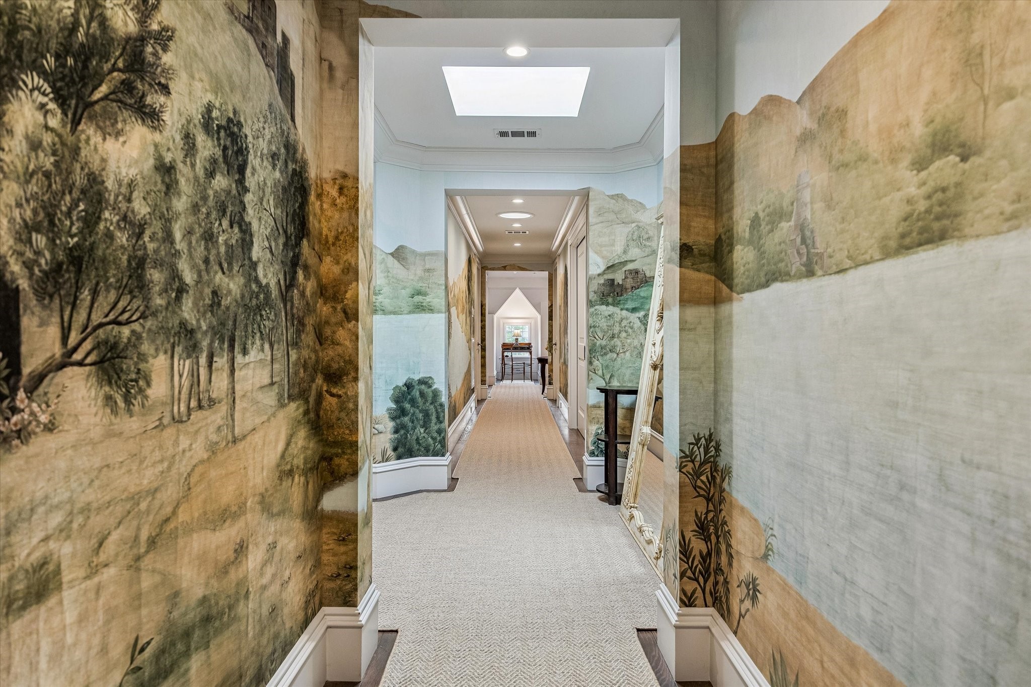 2158 Chilton Road Houston, TX 77019 - Photo 45 of 50 The third-floor hallway is elevated by a stunning panoramic mural—Arcadian Promenade by Iksel Decorative Arts, distributed by Schumacher—creating a gallery-like experience. A conveniently located wet bar enhances the space, offering both function and style for guests and everyday living.
