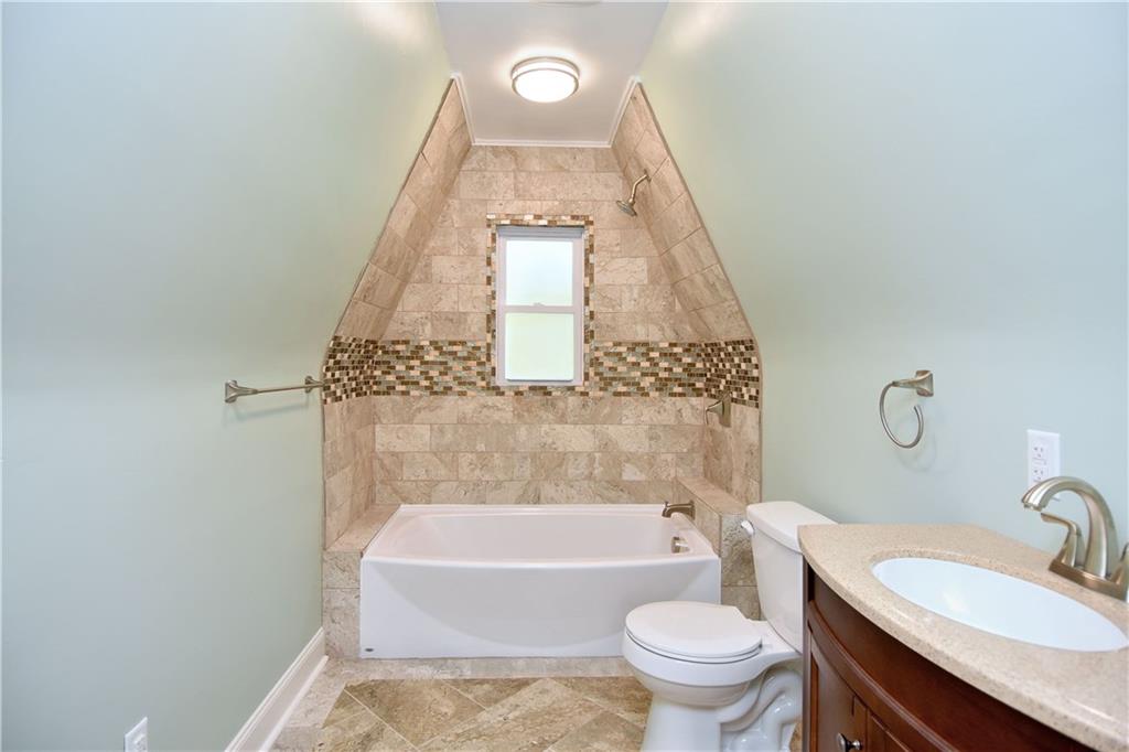1195 Harvey Run Road Freedom, PA 15042 - Photo 16 of 19 Beautifully tiled and modernized bathroom