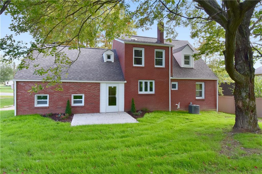 1195 Harvey Run Road Freedom, PA 15042 - Photo 18 of 19 View of the back of the house - with beautiful landscaping