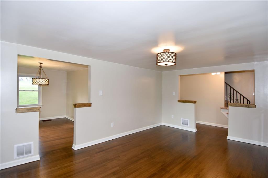 1195 Harvey Run Road Freedom, PA 15042 - Photo 6 of 19 Living Room: Open Floor Plan to the Dining Room
