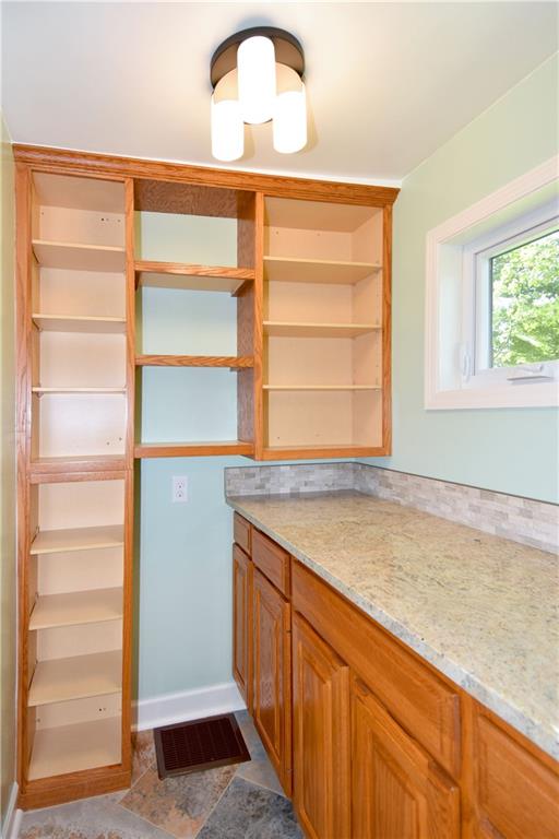 1195 Harvey Run Road Freedom, PA 15042 - Photo 10 of 19 Updated Kitchen Pantry with a Pocket Door
