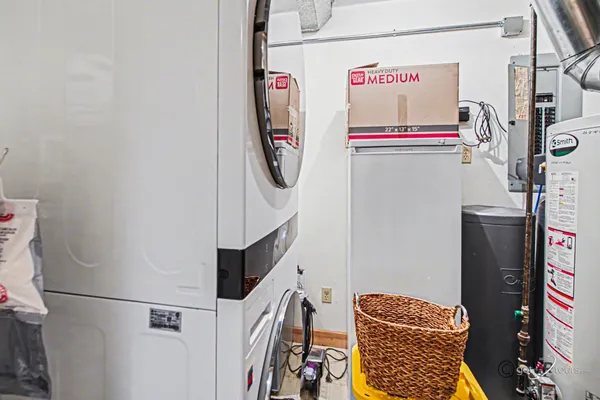 a view of balcony with wooden floor and outdoor seating