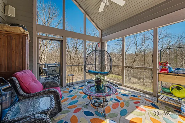 a bedroom with a bed and flat screen tv