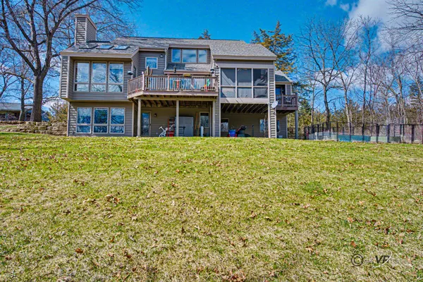a view of a bench in the backyard