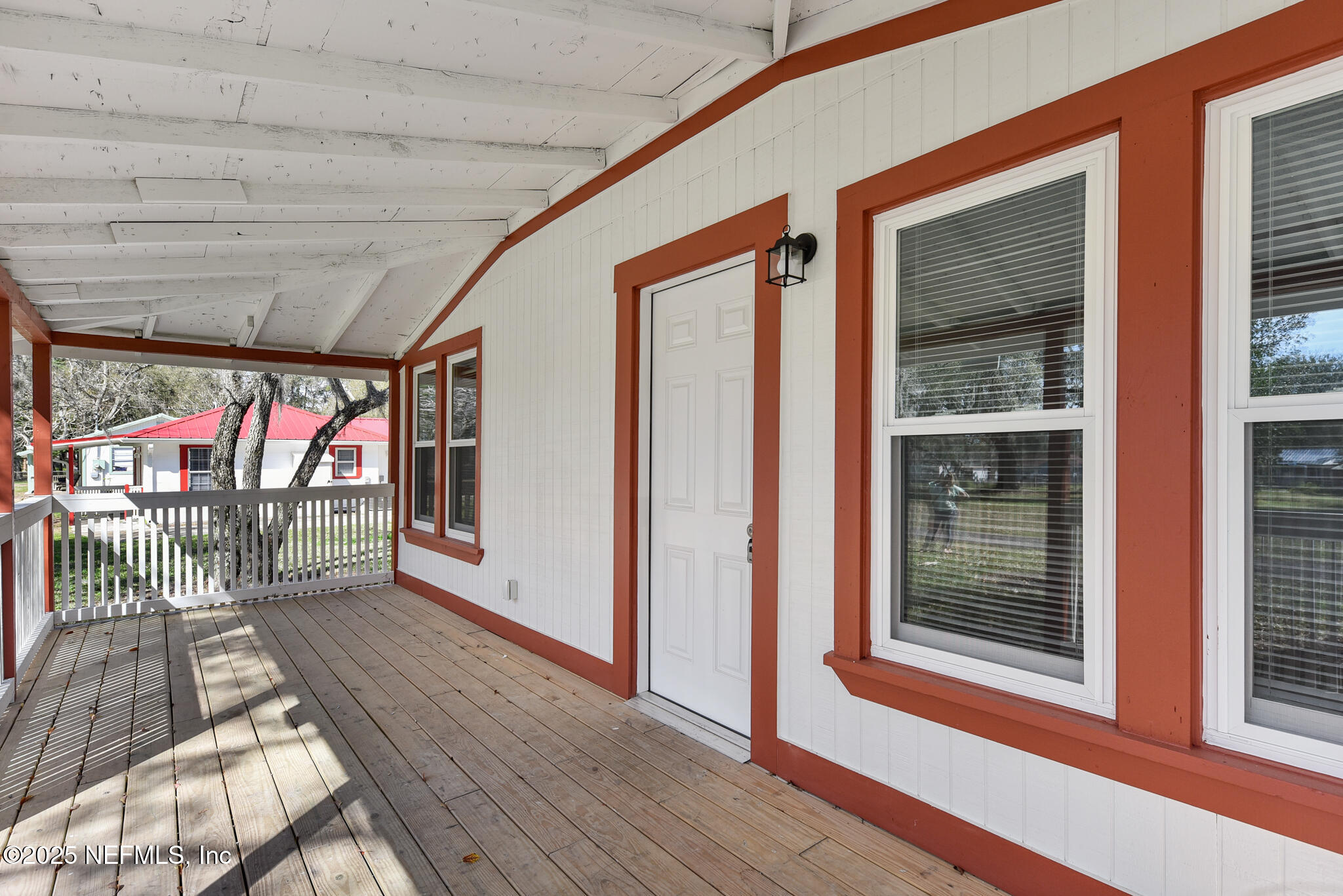 123 Mccallman Road Jacksonville, FL 32218 - Photo 38 of 62 a view of a balcony with wooden floor