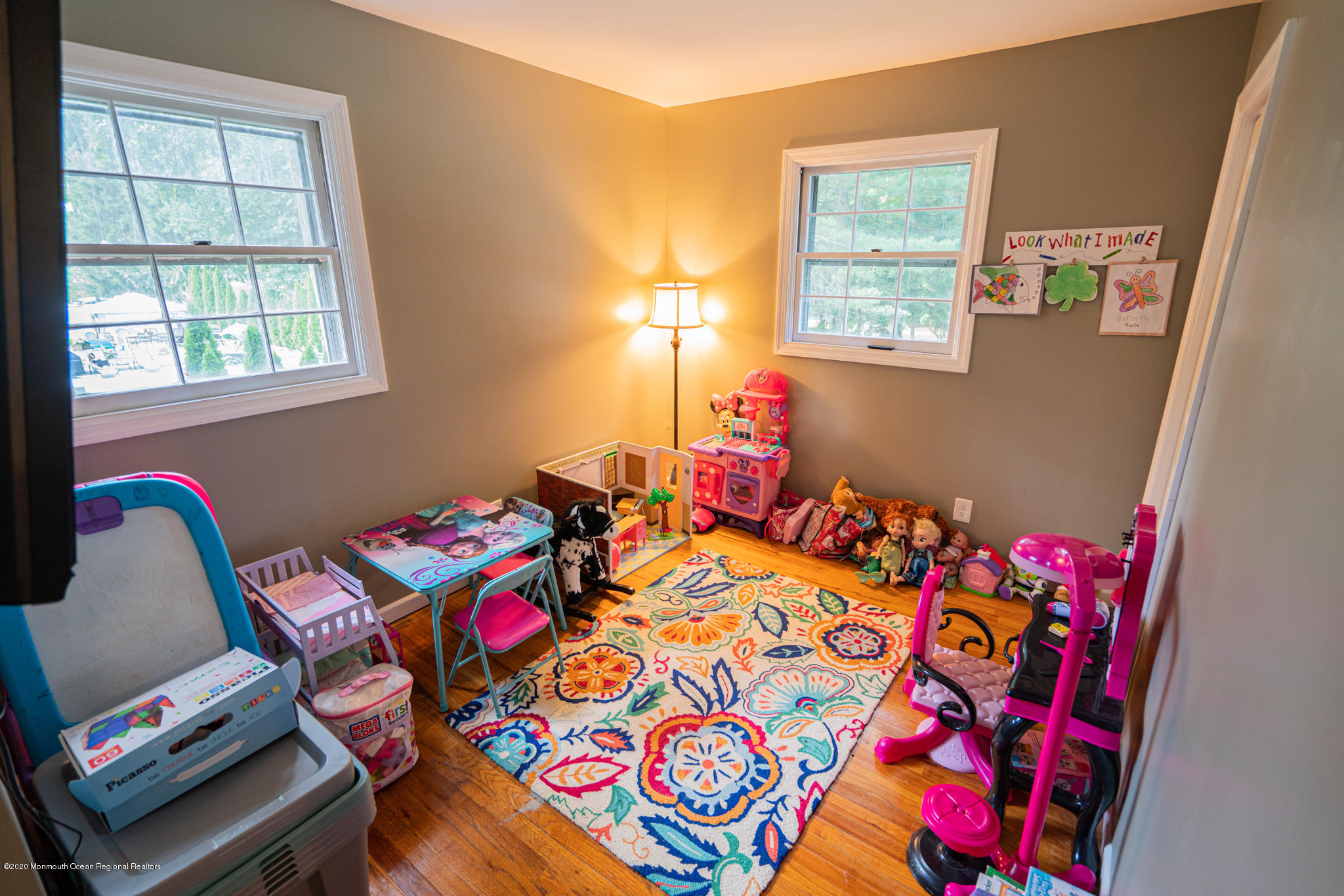 28 Holiday Road Manalapan, NJ 07726 - Photo 15 of 27 a bed room with a bed and a chair in it