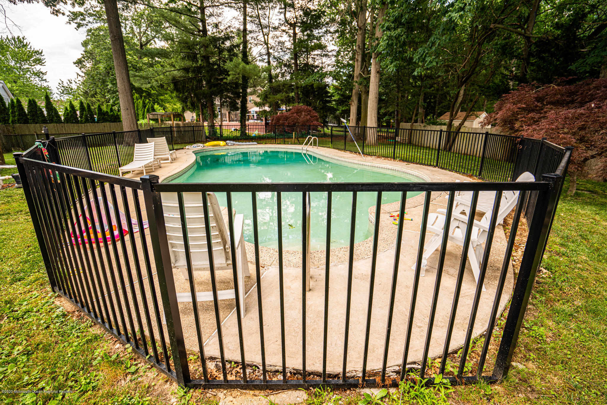 28 Holiday Road Manalapan, NJ 07726 - Photo 18 of 27 a view of backyard from deck having patio