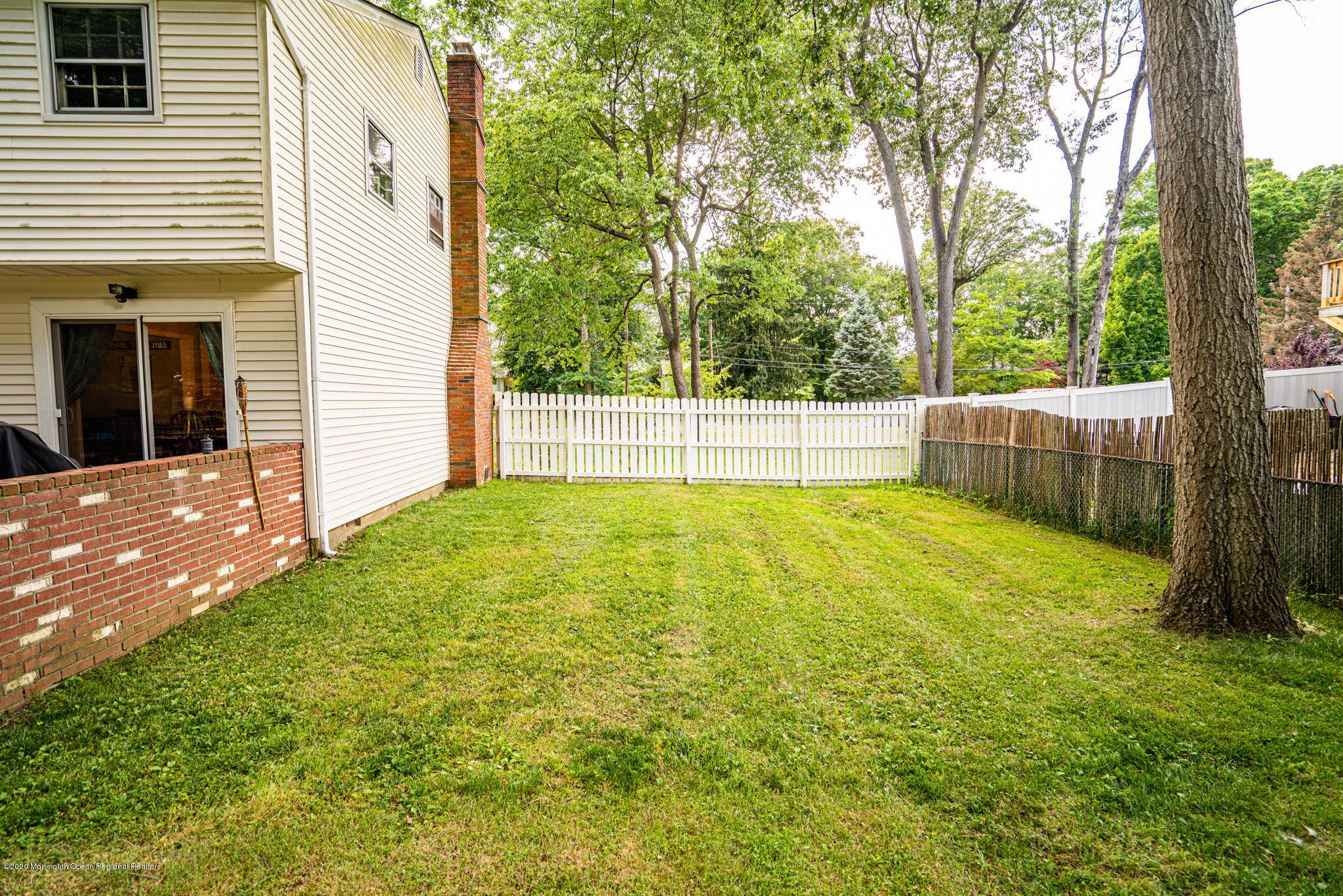 28 Holiday Road Manalapan, NJ 07726 - Photo 22 of 27 a view of a backyard