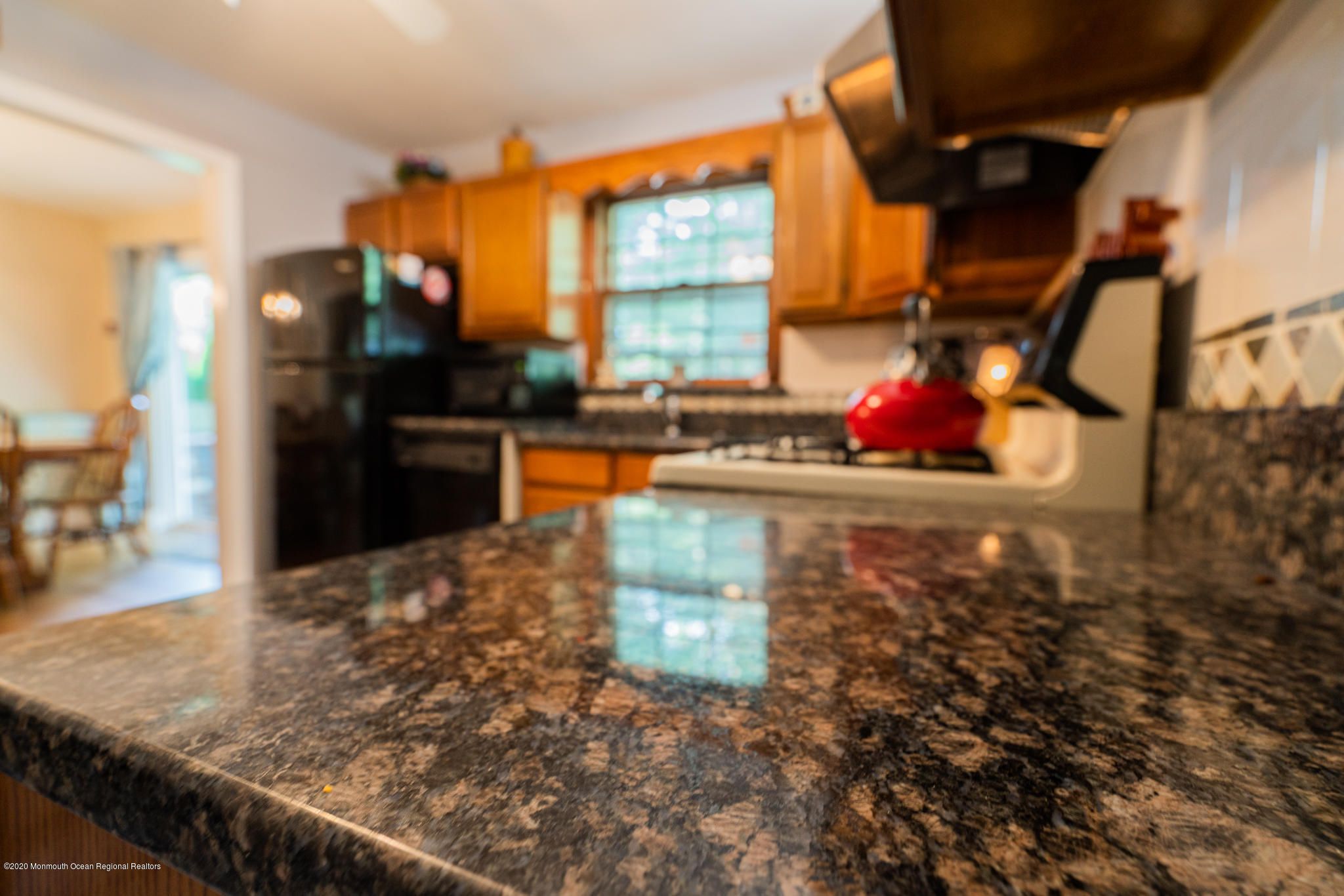 28 Holiday Road Manalapan, NJ 07726 - Photo 7 of 27 a room with water heater and wooden cabinets