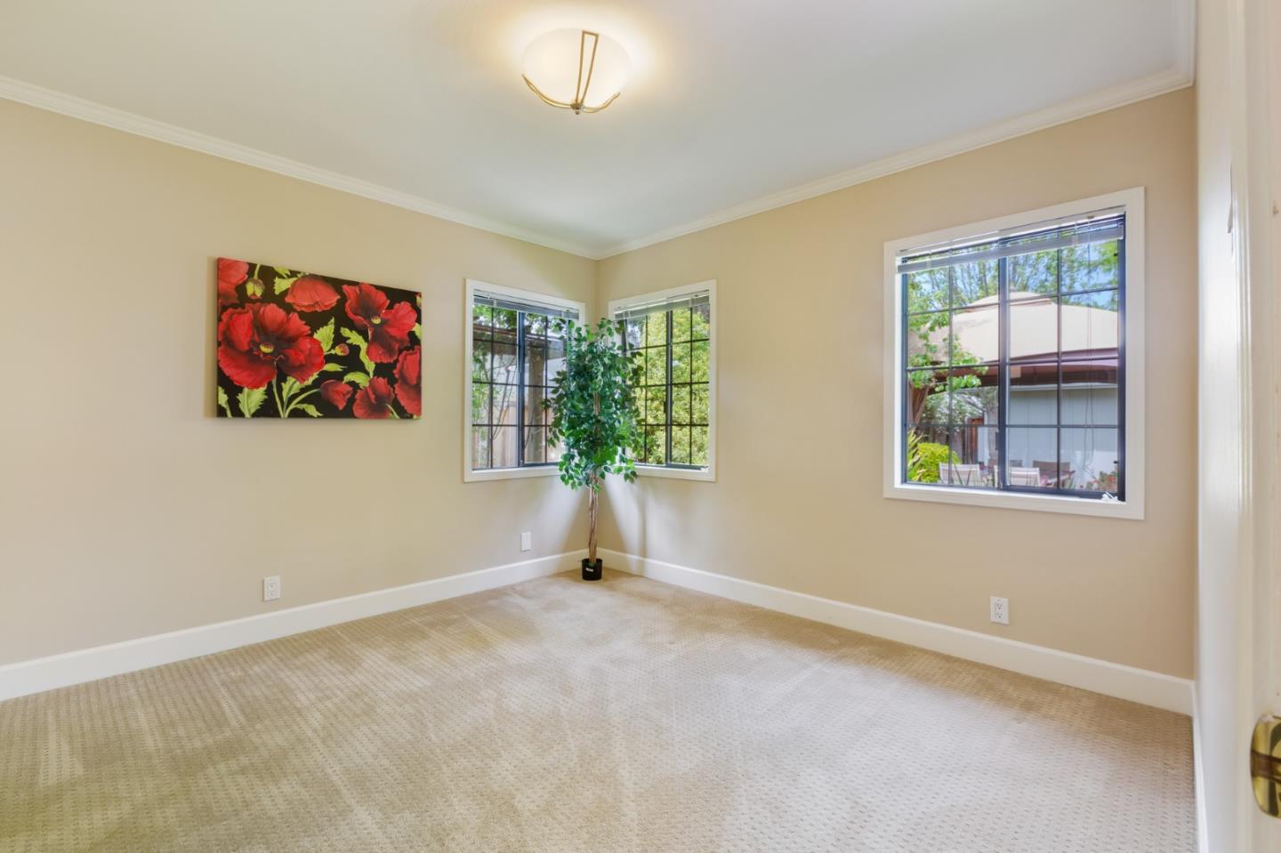 645 Chapman Drive Campbell, CA 95008 - Photo 14 of 33 an empty room with windows