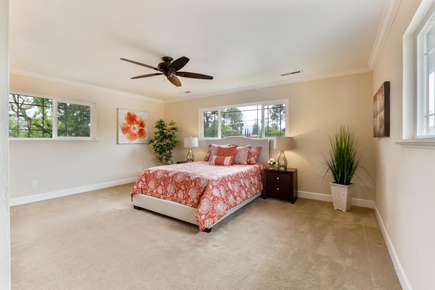645 Chapman Drive Campbell, CA 95008 - Photo 15 of 33 a bedroom with a bed chandelier and a window