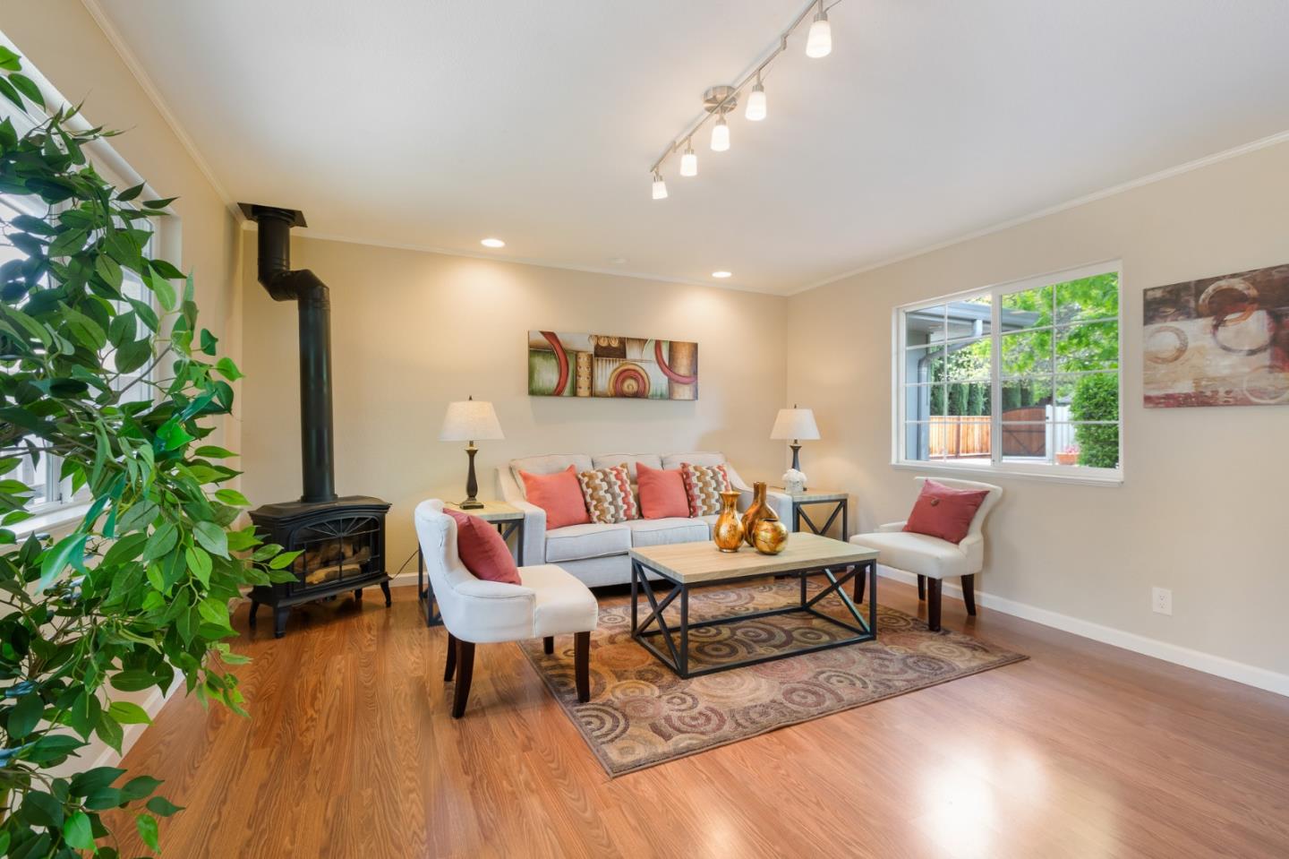 645 Chapman Drive Campbell, CA 95008 - Photo 22 of 33 a living room with furniture and a potted plant