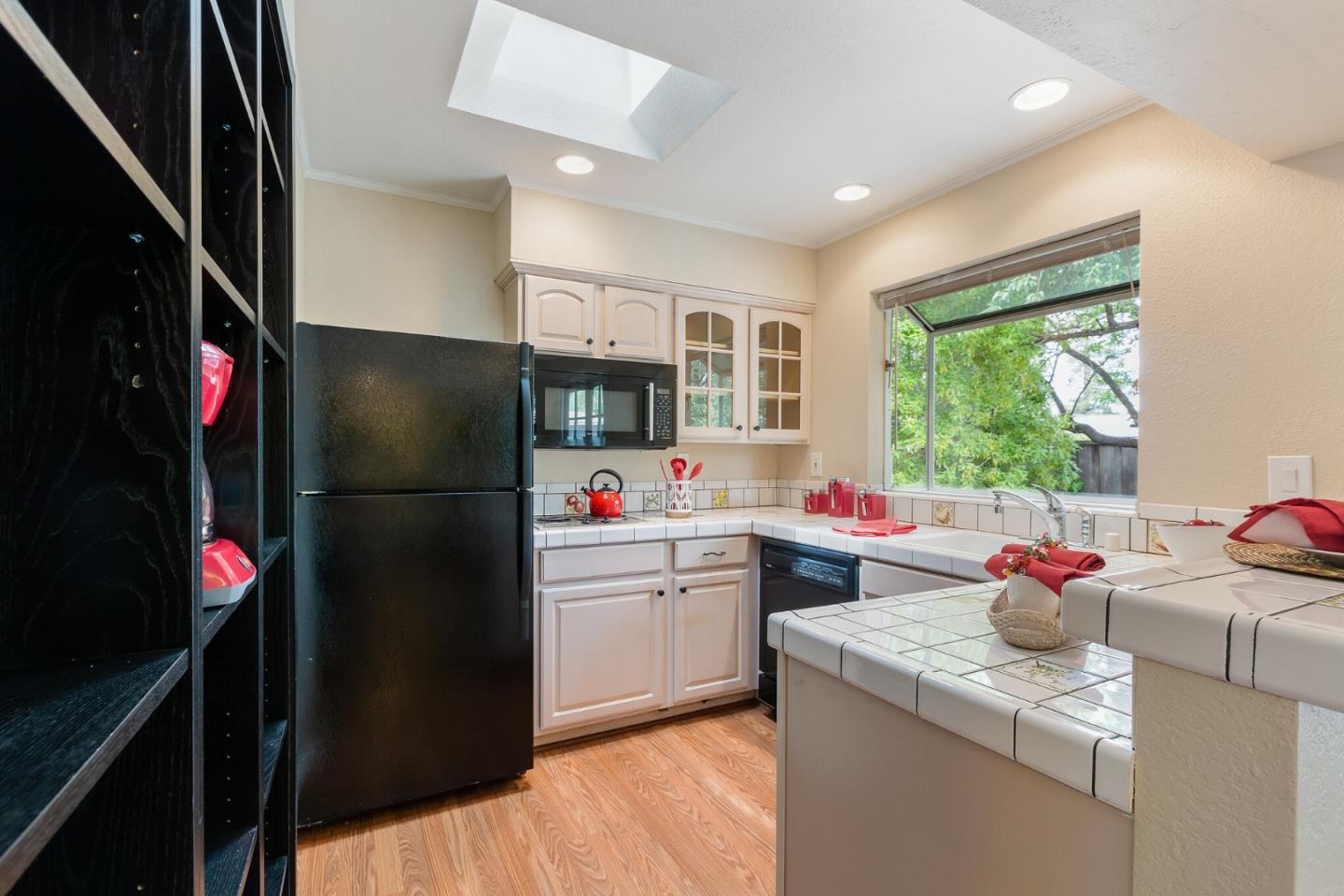 645 Chapman Drive Campbell, CA 95008 - Photo 24 of 33 a kitchen with a refrigerator and a sink